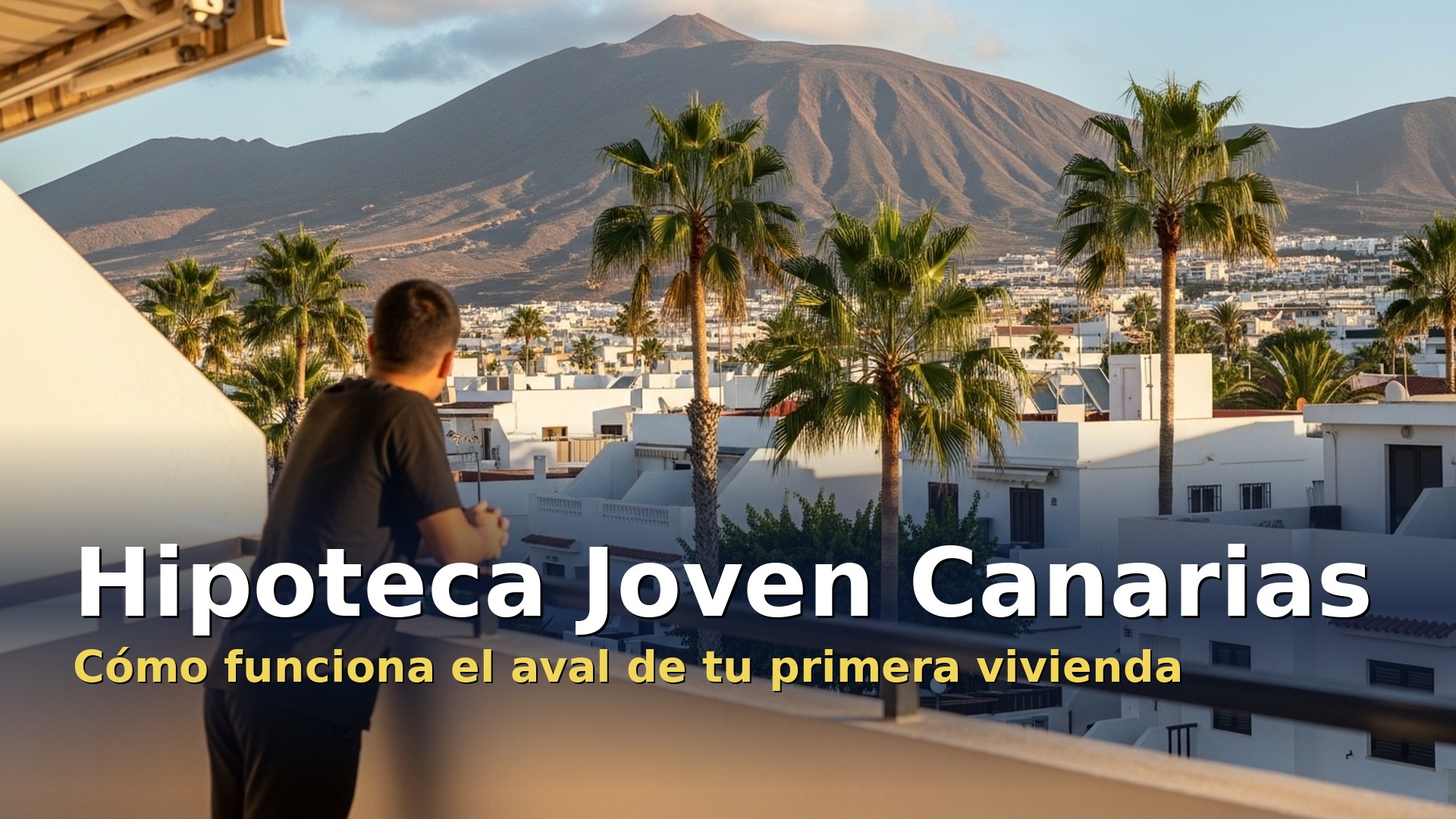 Hipoteca Joven Canarias: viviendas en un barrio de Canarias con montaña volcánica al fondo